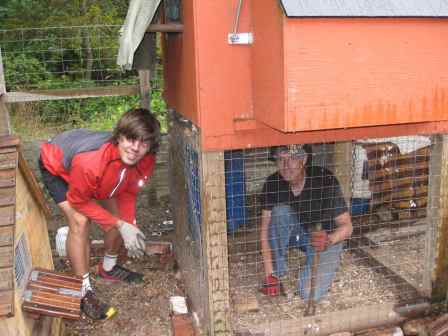 American WWOOFers Sean & Steve Securing Chicken Coop